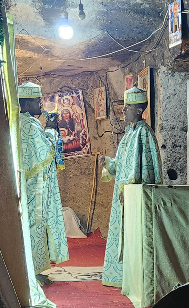 Priests inside Rock Church