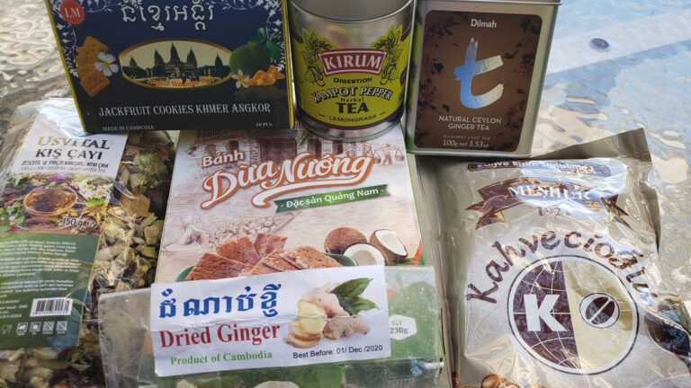 A variety of tea products are displayed on the table.