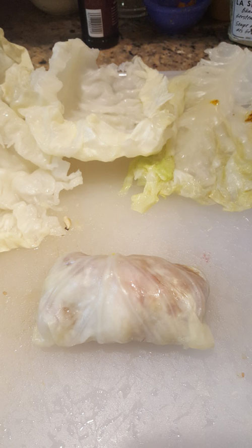 How a just-rolled-up cabbage roll should look, seam down.