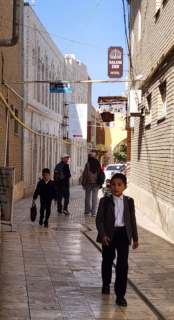 Bukhara boy on his way home from school.